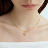 Vonda Lye Metal Pendant Necklace & Bone Chain Earrings