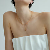 Delfina U-Shaped Pendant Necklace & Geometric Earrings