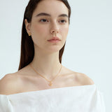Vonda Lye Metal Pendant Necklace & Bone Chain Earrings