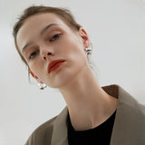 Zain Exaggerated C-Shaped Metal Earrings